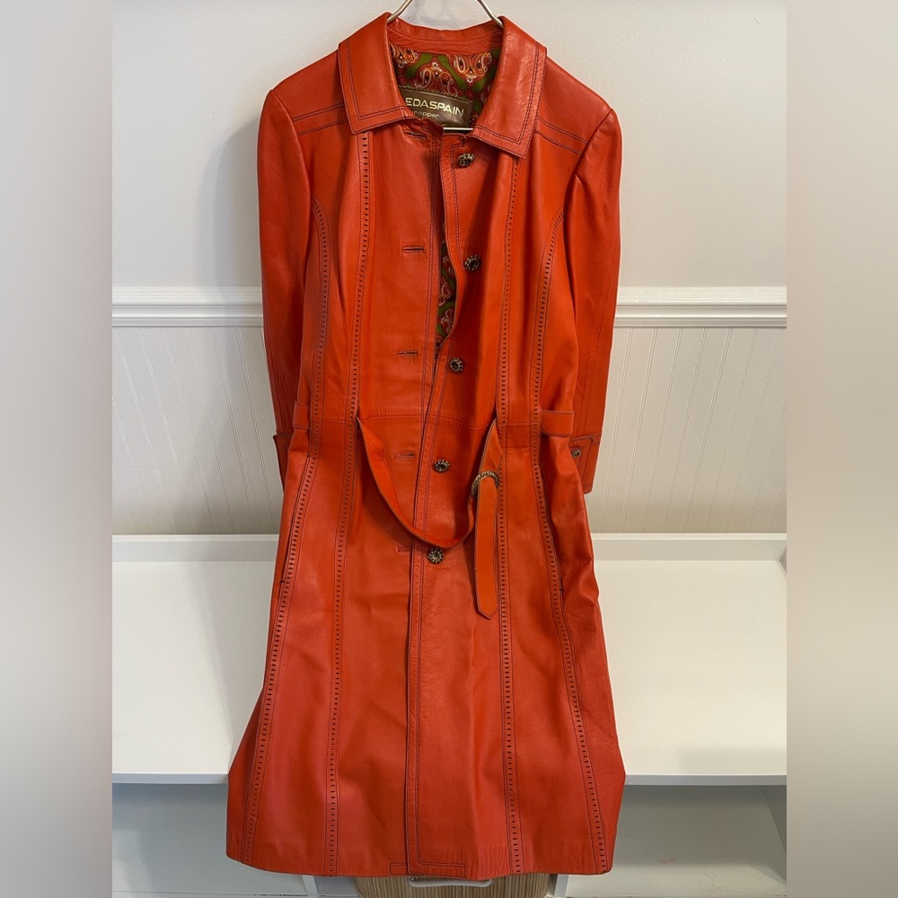 Leda Spain vintage tangerine leather trench coat.